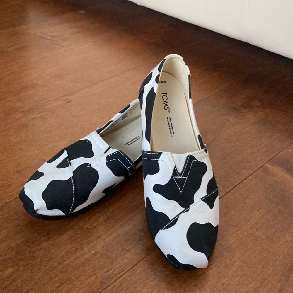 Tom’s cow print loafers